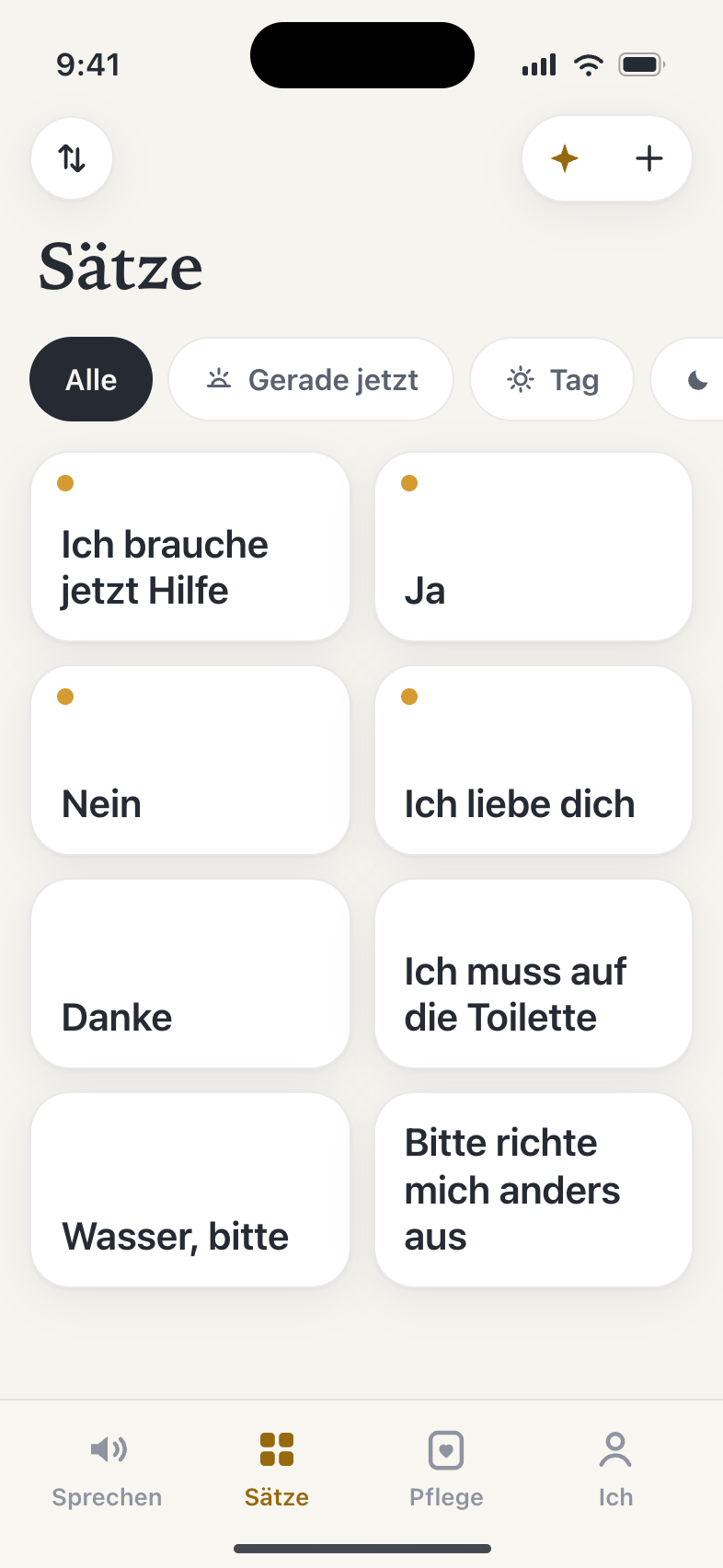 Die Sätze-Tafel: ein Raster großer Satz-Kacheln wie 'Ich brauche jetzt Hilfe', 'Ja' und 'Ich liebe dich', mit angepinnten Favoriten, markiert durch einen goldenen Punkt.