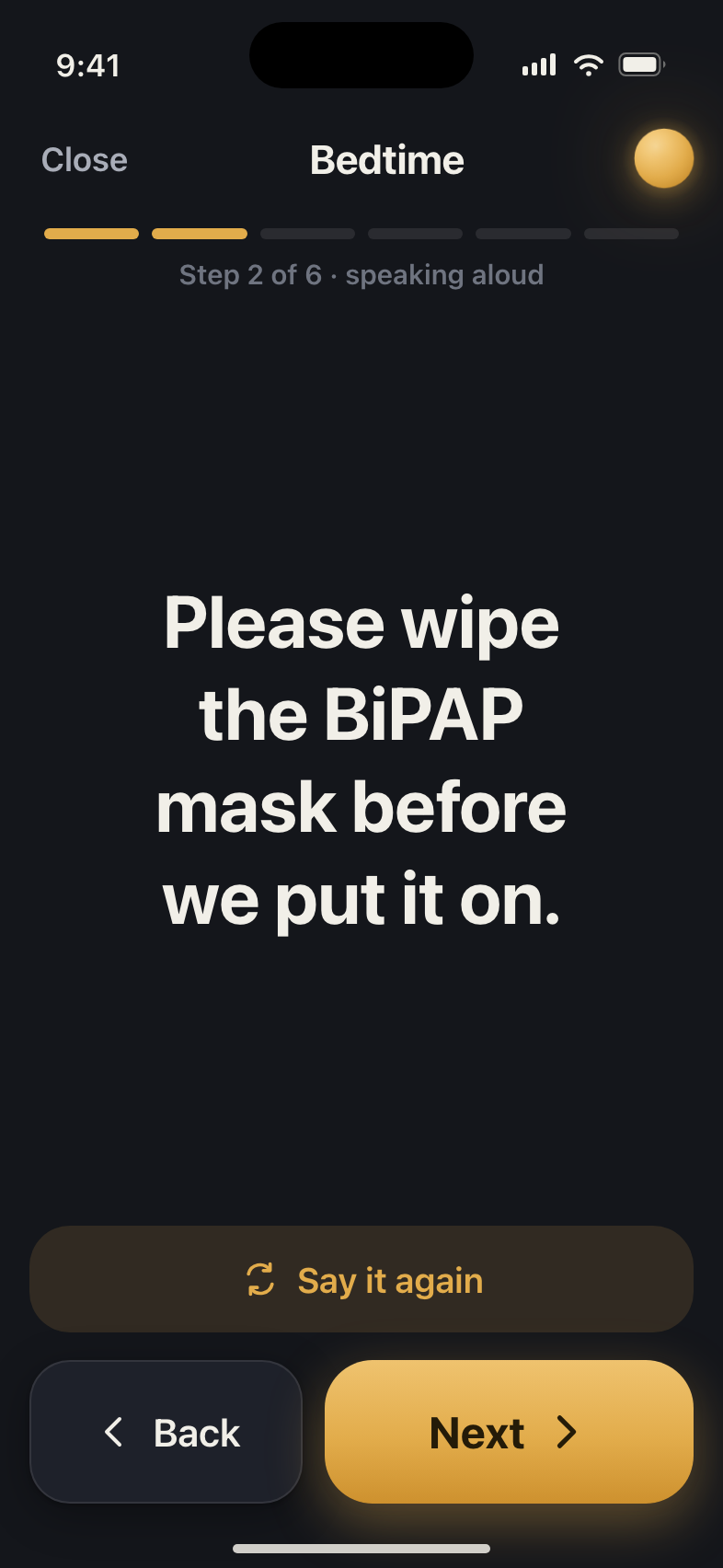The night routine player on a dark screen, speaking a bedtime step aloud: 'Please wipe the BiPAP mask before we put it on.'